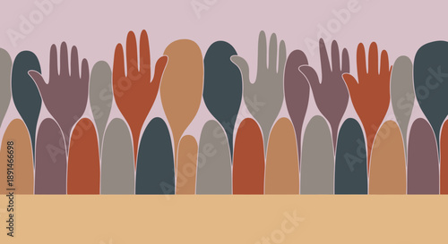 Diverse group of people raising their hands in a crowd.