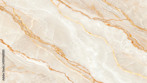 Beautiful beige marble texture with golden veins on surface