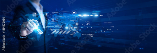 A digital strategist checks keyword rankings for global networking, using search engine optimization to boost visibility and attract organic traffic from international markets.