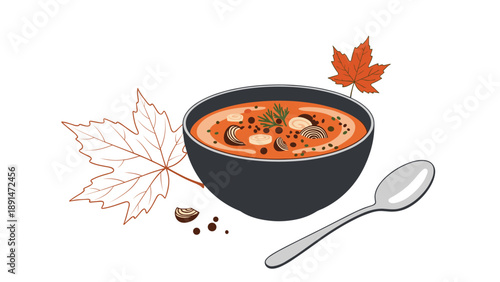Bowl of steaming vegetable soup is served with a spoon and decorated with dry autumn leaves, suggesting a warm seasonal dish.