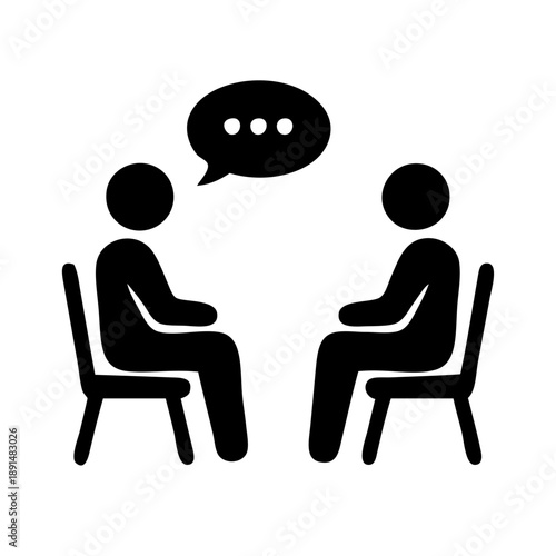 Two people engaging in conversation