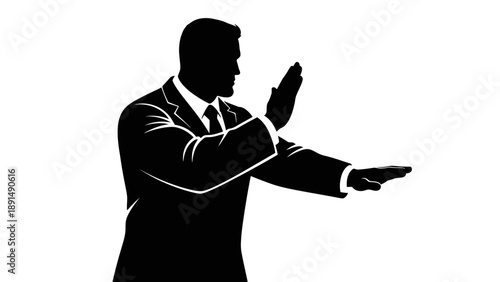 Silhouette of a businessman making a stop gesture with his hands.