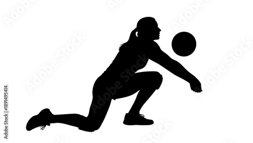 Silhouette of a Female Volleyball Player Serving the Ball.
