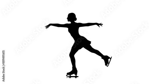 Silhouette of a figure skater performing on ice.