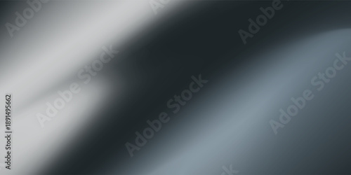 A car's hood is covered in a shiny, reflective surface. The surface is smooth and shiny, giving the car a sleek and modern appearance