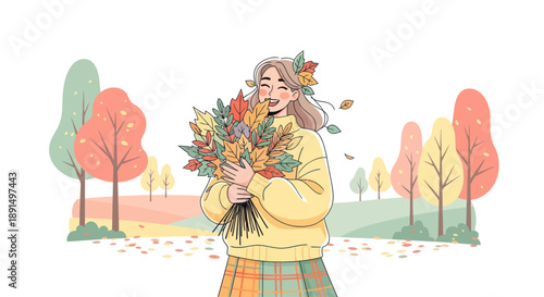 Happy young woman enjoying the autumn season with a bouquet of colorful leaves