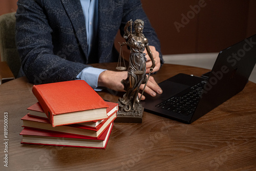 Принти на полотні Attorney studying legal papers and notes at desk, preparing for trial in modern office