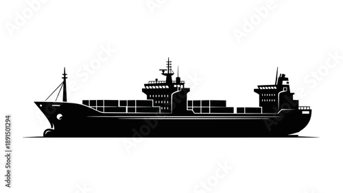Silhouette of a large cargo ship carrying containers on the ocean.