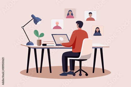 Man working on laptop with video conference participants displayed on screen