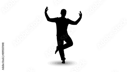 Silhouette of a man practicing yoga tree pose.