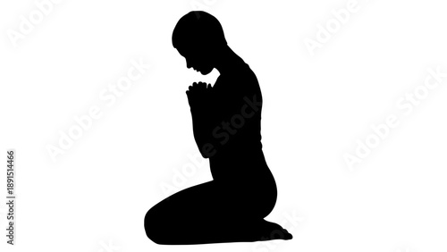 Silhouette of a person kneeling in prayer with hands clasped.