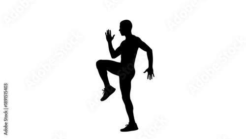 Silhouette of a man performing a high knee exercise.