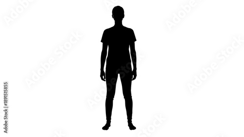 Silhouette of a person standing in a studio.