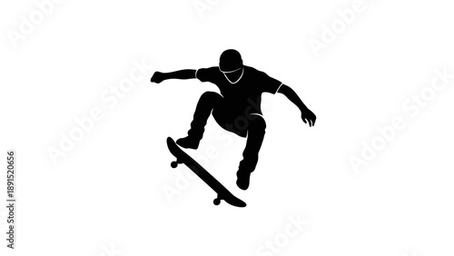 Silhouette of Skateboarder Performing a Trick in Mid-Air.