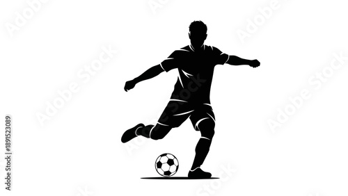 Silhouette of a soccer player kicking a ball during a game.