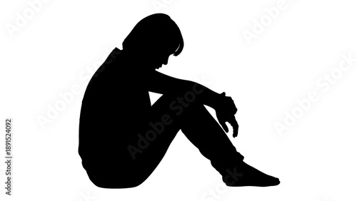 Silhouette of a Seated Person in a State of Despair.