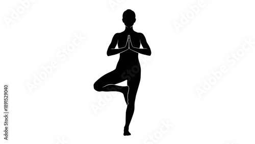 Silhouette of a woman in tree yoga pose.