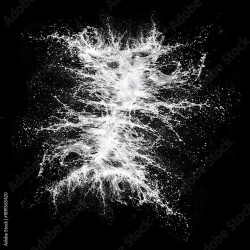 A dynamic splash of water captured in motion against a dark backdrop