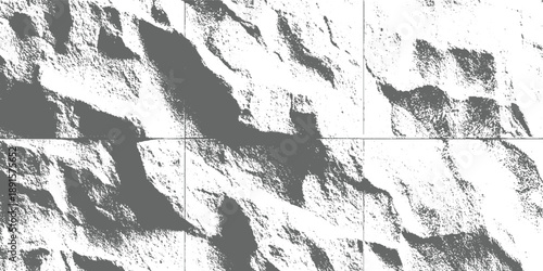 Stark monochrome abstract texture of rough rock formations with deep shadows and granular detail stone