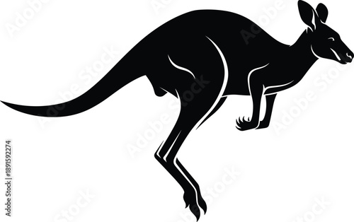 Black silhouette of an Australian kangaroo in a jumping motion with strong back legs and a long tail for wildlife.