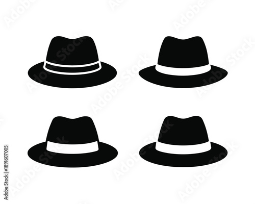 A set of four black fedora hats with white bands on a plain white background
