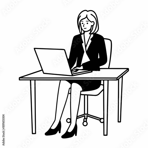 Businessman working on a laptop at an office desk