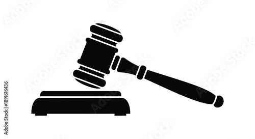 A stark black silhouette depicts a judge s gavel resting on a sound block symbolizing justice and legal proceedings silhouette