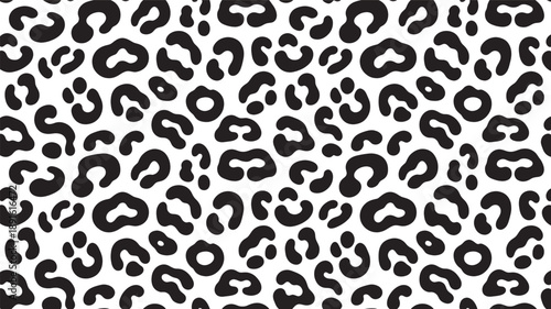 Monochrome black and white graphic pattern featuring abstract, repeating, stylized leopard spots creates a bold, continuous surface texture background for textiles.