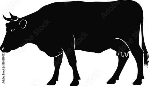 A black silhouette of a cow standing in profile against a white background
