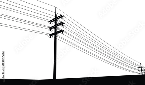Silhouette of Electricity Poles and Power Lines Against a White Sky utility pole transmission tower