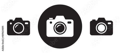 Simple camera icons in black and white, one on black circle background, for photography and visual content