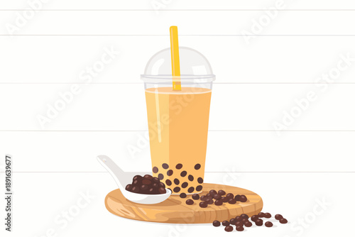 Refreshing bubble tea with classic black tapioca pearls served in a sleek glass on a wooden coaster.