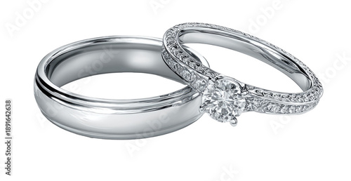 Two elegant, overlapping wedding bands, one with a center diamond and pave setting
