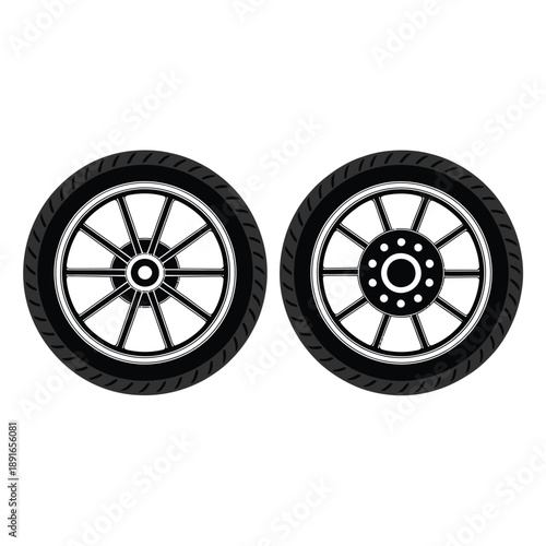 Two black and white illustrations of vehicle tires with differing spoke patterns