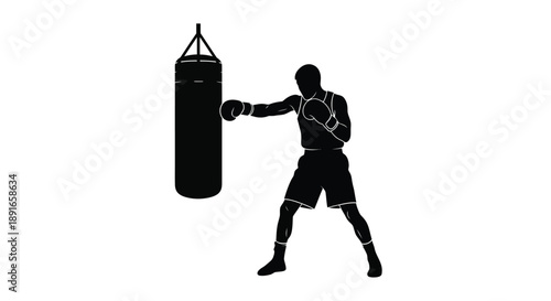 Silhouette of a boxer practicing a punch on a hanging punching bag