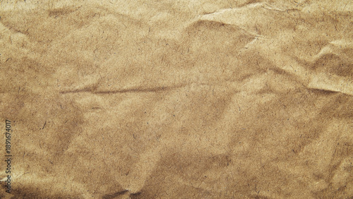 Abstract crumpled and creased recycle brown paper texture background. 