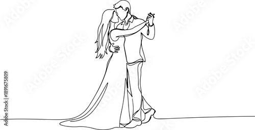 Romantic couple dancing together in elegant attire