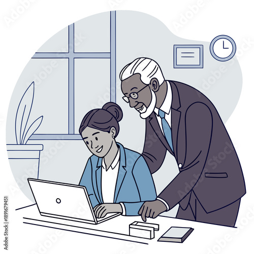 Experienced mentor guiding a young female professional on a laptop in an office