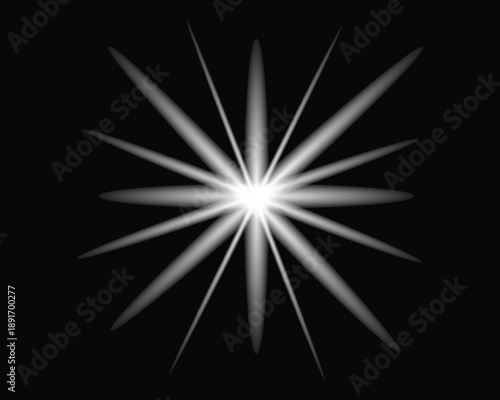 A bright white starburst on a black background