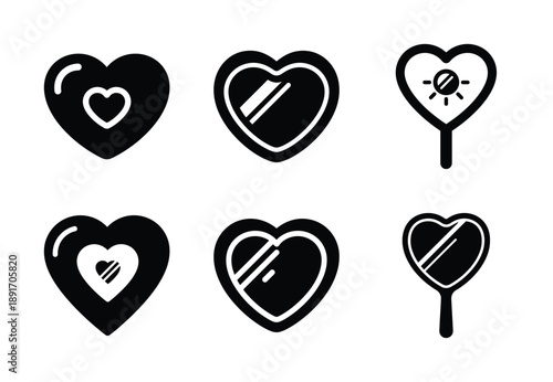 Collection of a black heart mirror vector icon set. valentines day silhouette icons.