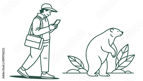 Man engrossed in his smartphone walks obliviously past a large bear standing near foliage.
