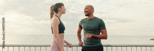 Wallpaper Mural The dialog of an active young sporty couple in sportswear, two athletes enjoy conversation. Panoramic Torontodigital.ca