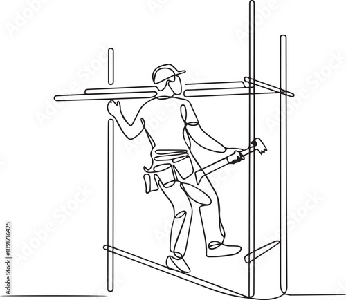 Construction worker installing metal frame structure on scaffolding