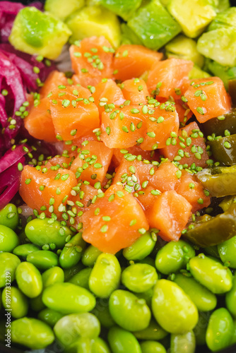 Close-up of healthy poke bowl with fresh salmon and edamame
