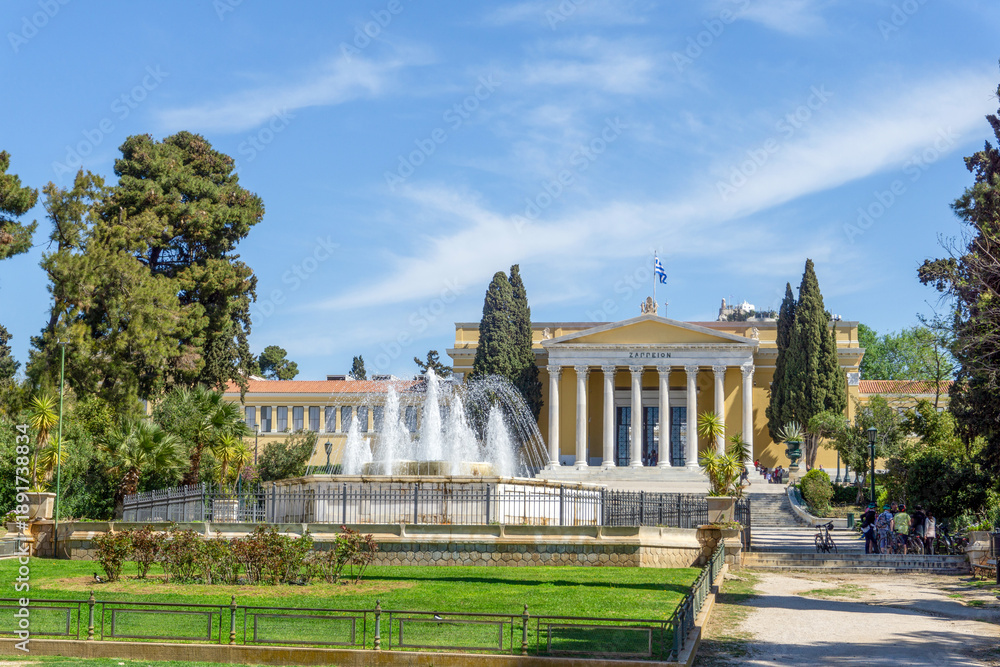 Obraz premium Neoclassical Architecture of Zappeion Megaron in Athens Greece Featuring Iconic Yellow Facade White Marble Columns and Monumental Fountain in the National Gardens