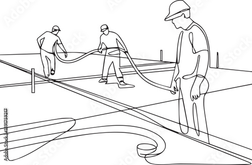 Construction workers operating heavy machinery on a building site