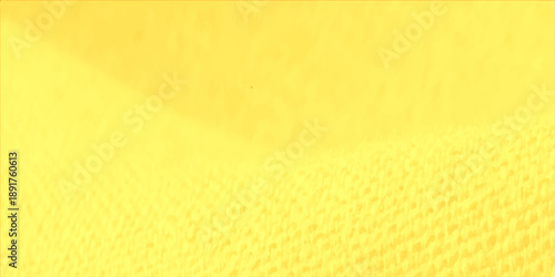 A vintage blank parchment surface featuring a yellow paper texture and grunge material pattern makes for an abstract gold design background and textured art wallpaper