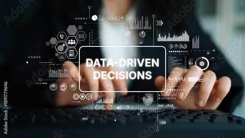 Data-Driven Decisions Concept with Digital Screen and Hands on Keyboard in Business Environment. Asymptotic smart data analytic. © InfiniteFlow