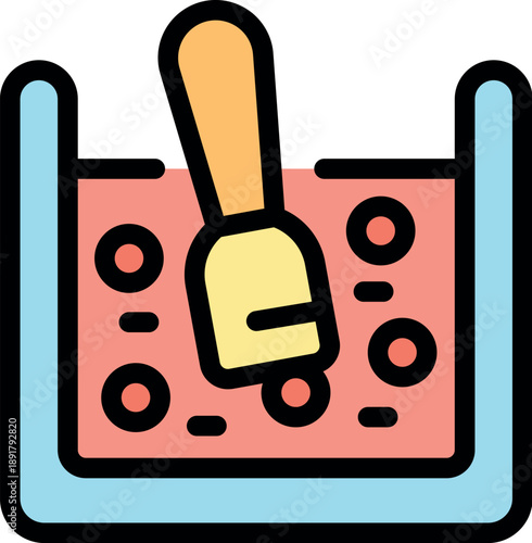 Pink cosmetic mask being applied with wooden spatula, skin care treatment in spa