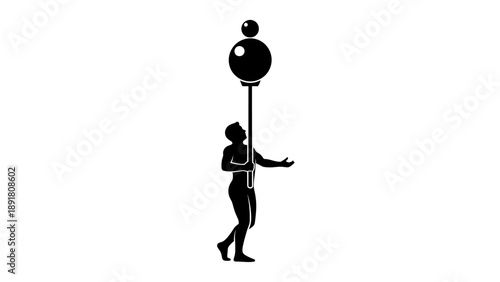 a person balancing a ball on a stick.